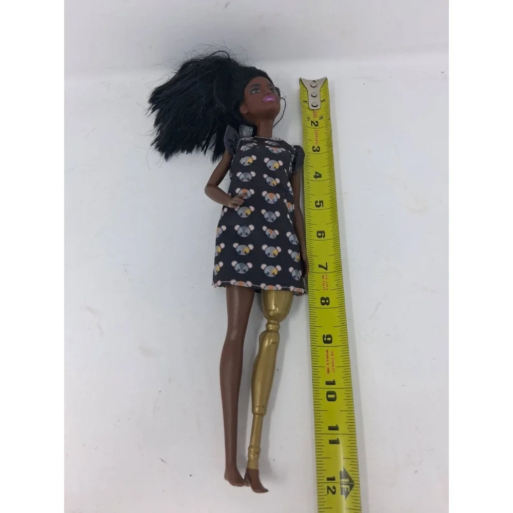 mattel 2014 african american doll with prosthetic leg. U